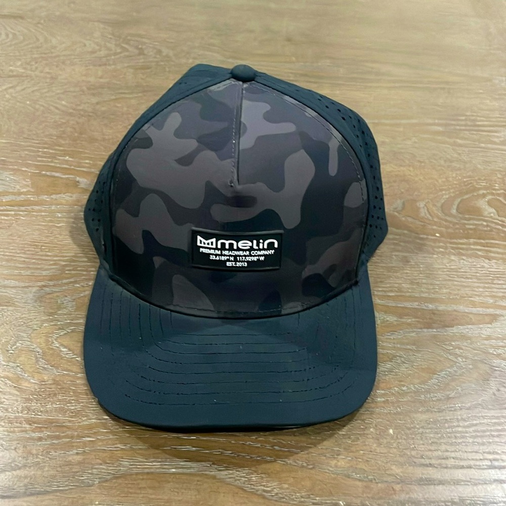 Black camouflage Melin Hydro Odyssey Series adjustable hat/baseball cap. Worn 2x